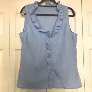 Baby blue ruffle trim sleeveless top.
